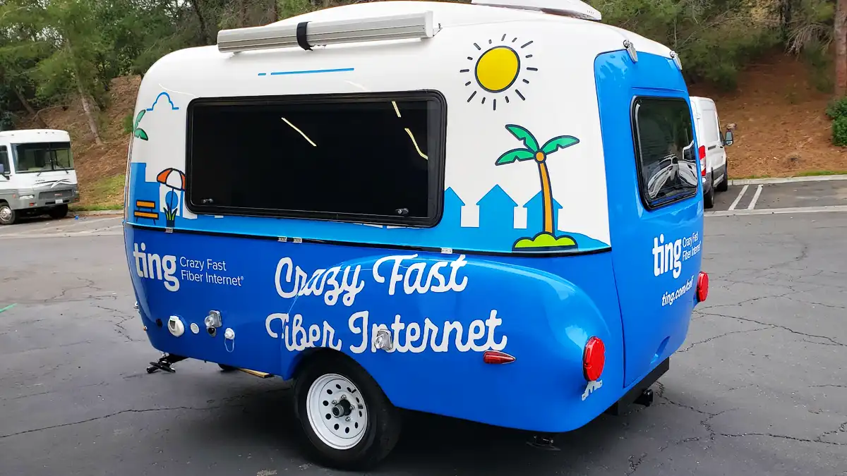 Innovative Sign Systems - Ting Fiber Wrap Trailer (Encinitas) Bright blue and white Ting Fiber Internet trailer wrap by Innovative Sign Systems parked in Encinitas